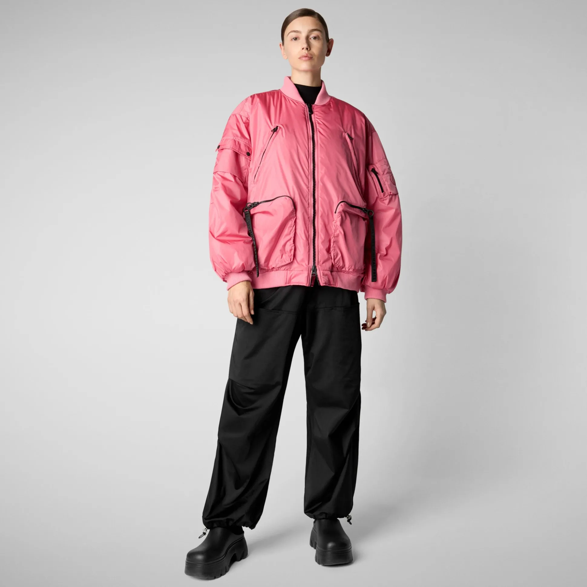 Unisex Usher Bomber Jacket in Bloom Pink